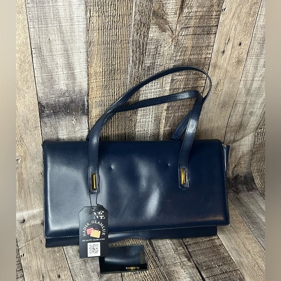 Delvaux Handbags - Delvaux Vintage Blue navy leather handbag 1829